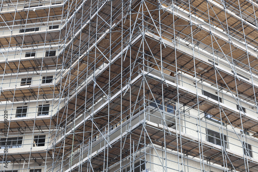 scaffolding on building site of new apartment building