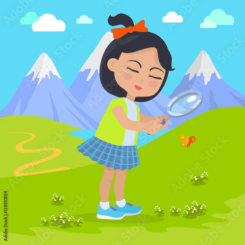 Girl Holds Magnifying Glass in Hands at Mountains