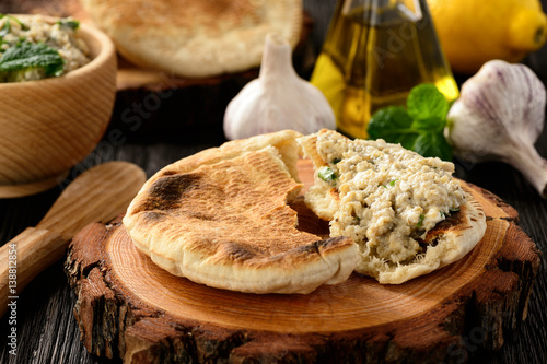 Traditional greek eggplant spread (dip) with pita bread. photo