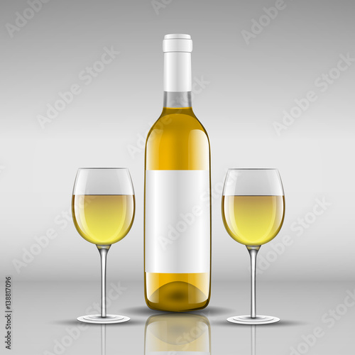 bottle of white wine with glass