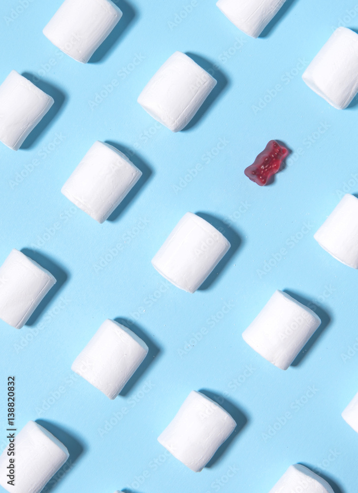 Sweeties marshmallows over blue table background. Sweeties marshmallows over blue table background.
