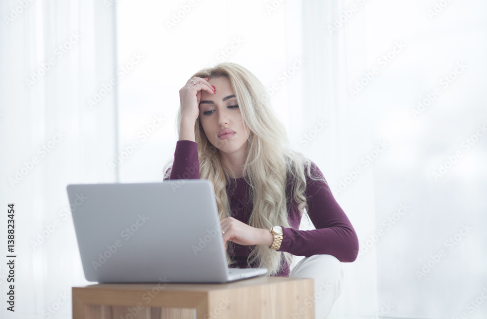 young beautiful woman using a laptop computer at home young beautiful woman using a laptop computer at home