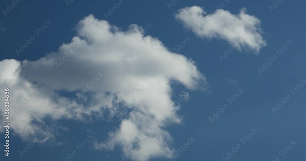 white clouds running on blue sky white clouds running on blue sky