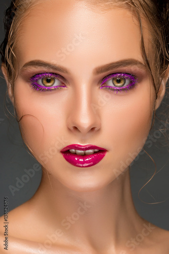 Beauty woman face closeup isolated on black background. Beautiful