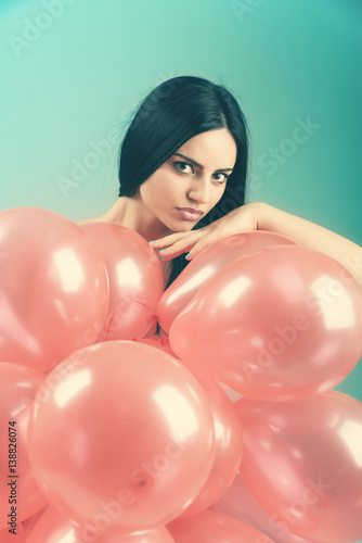 Girl with red balloons