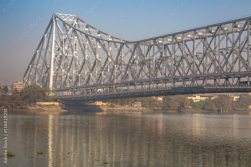 Fototapeta premium Howrah Bridge - The Cantilever bridge on river Hooghly at Kolkata, India in close up.