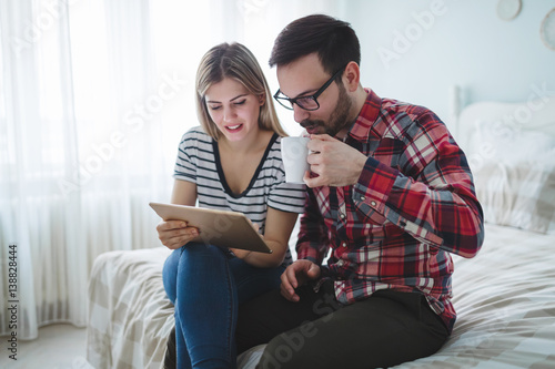 Couple shopping online from home