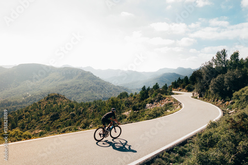 Cyclist on the mountain road