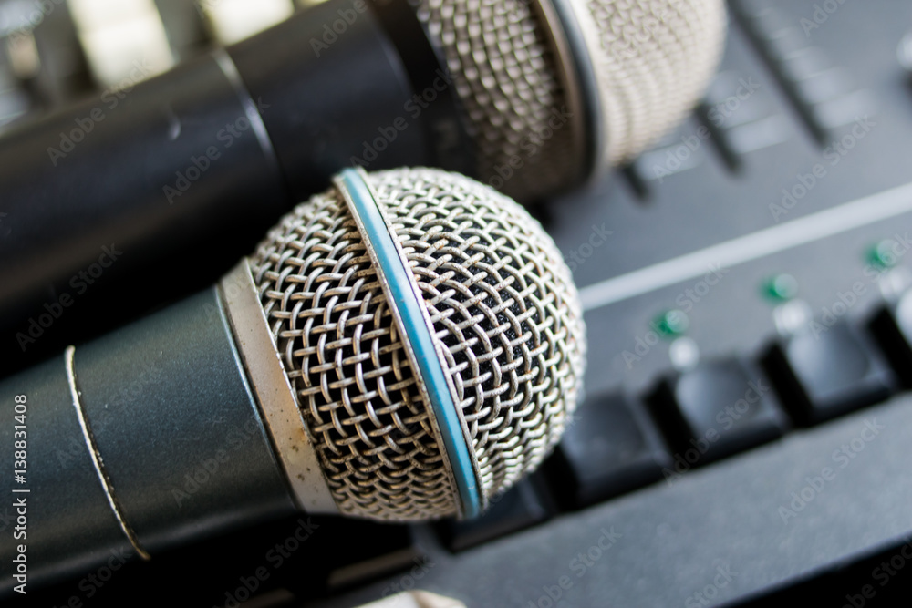 Obraz premium close up microphone on the sound mixer