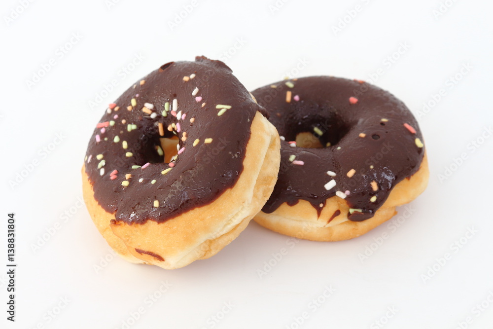 Candy, chocolate donuts on a white background.