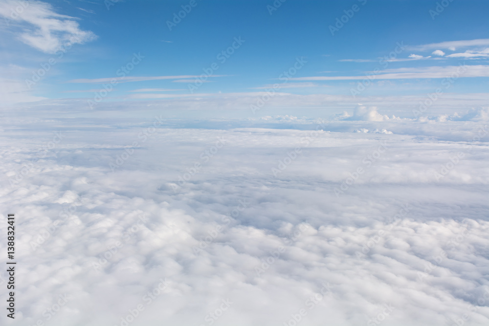 Clouds in the sky seen from an airplane above 