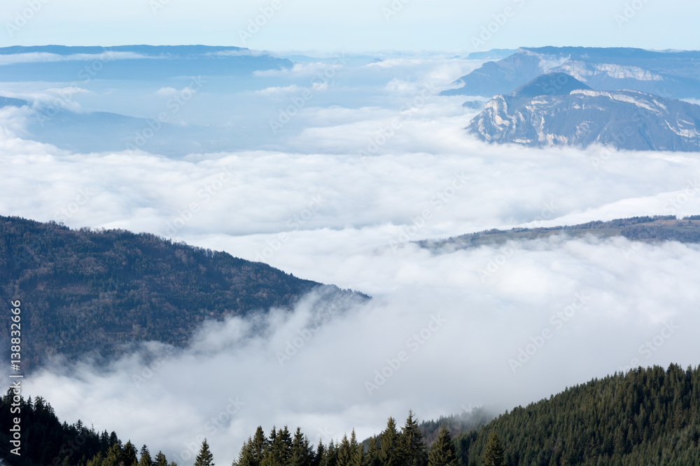 Aerial photo cloudy valley in the alps 