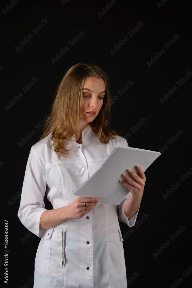 Attractive young female doctor on black Attractive young female doctor on black