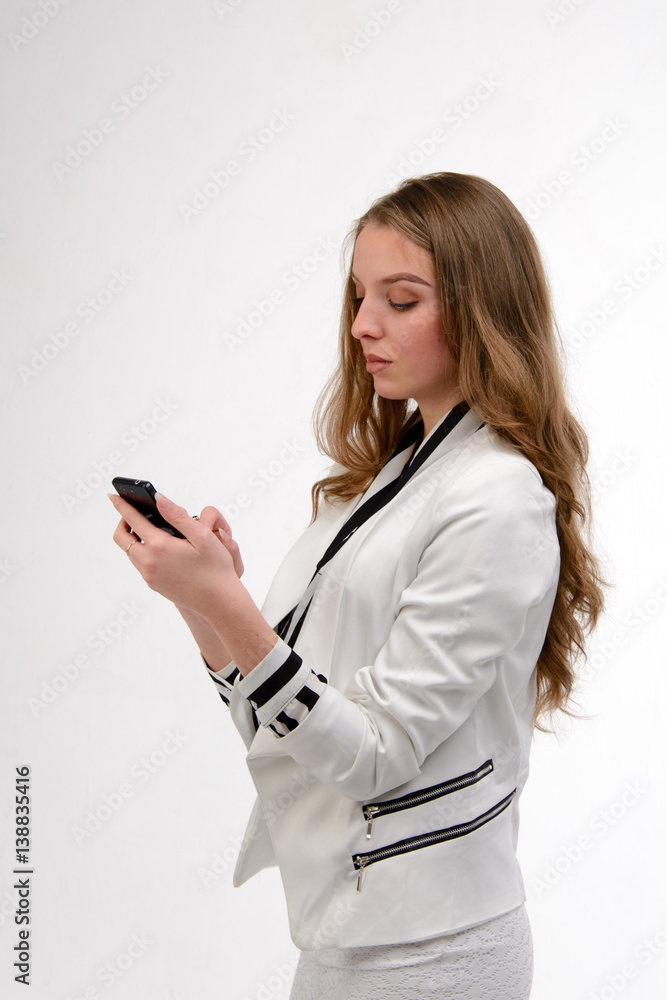 Young business woman using mobile phone phone