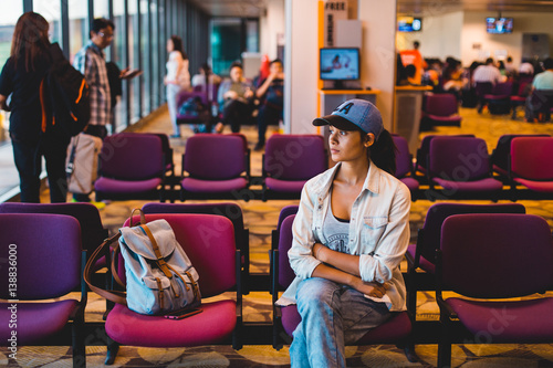 Young woman waiting at airport lounge