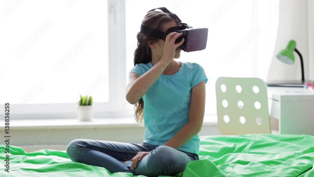 happy girl in vr headset or 3d glasses at home happy girl in vr headset or 3d glasses at home