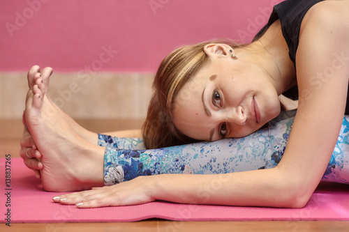 Fitness or yoga class  woman doing exercise