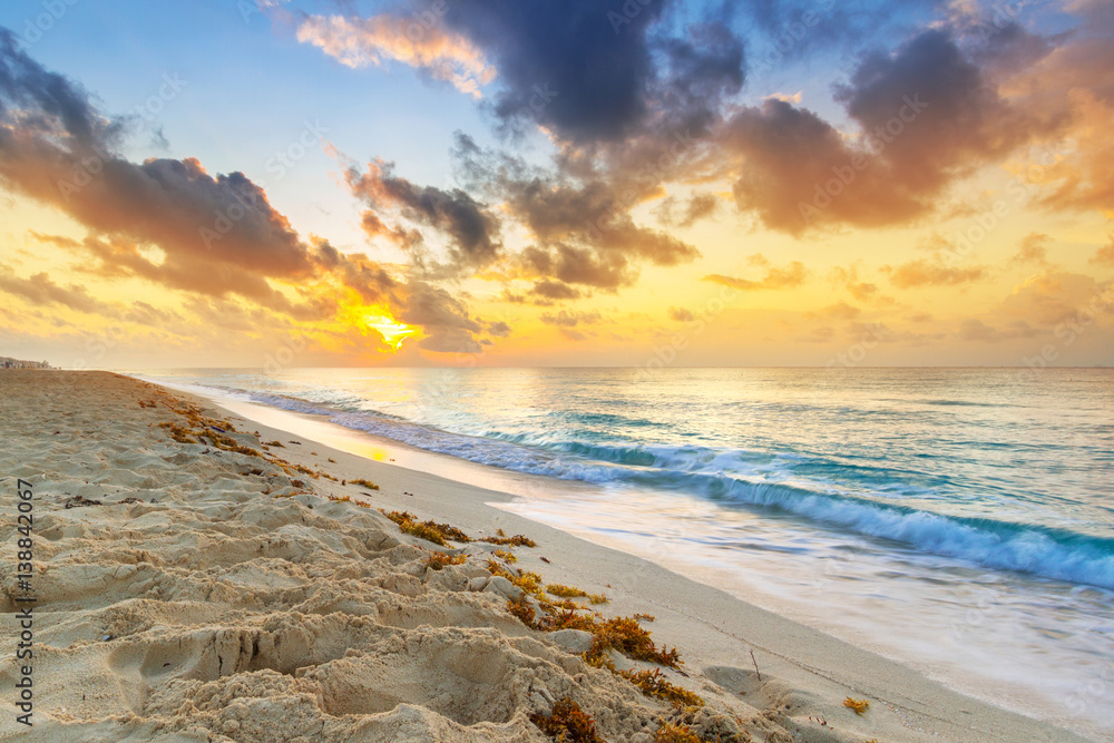 Sunrise on the beach of Playa del Carmen at caribbean sea, Mexico