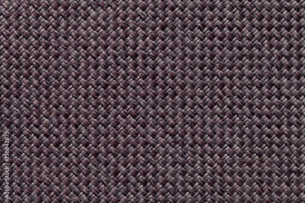 Dark brown textile background closeup. Structure of the fabric macro