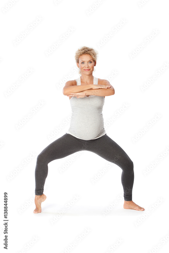 Pregnant woman exercise, standing position Pregnant woman exercise, standing position