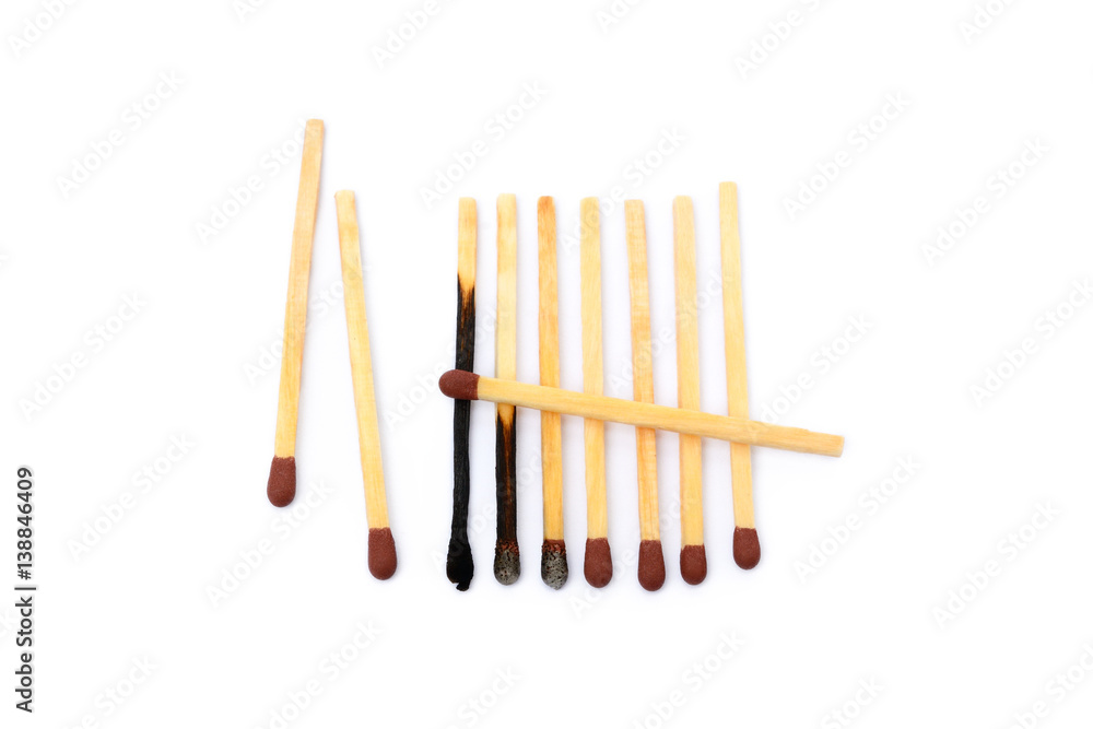 Laid used matchsticks isolated on white background Laid used matchsticks isolated on white background