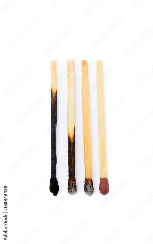 Laid used matchsticks isolated on white background Laid used matchsticks isolated on white background