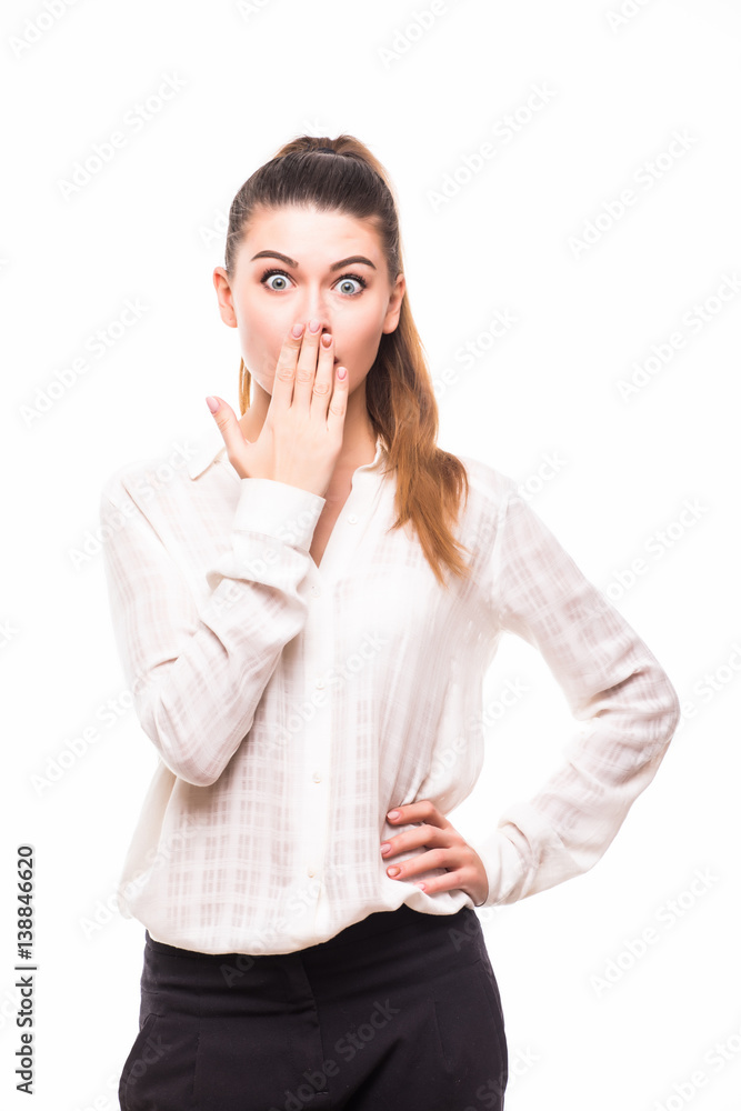 Shocked young woman covers her mouth with hands Shocked young woman covers her mouth with hands