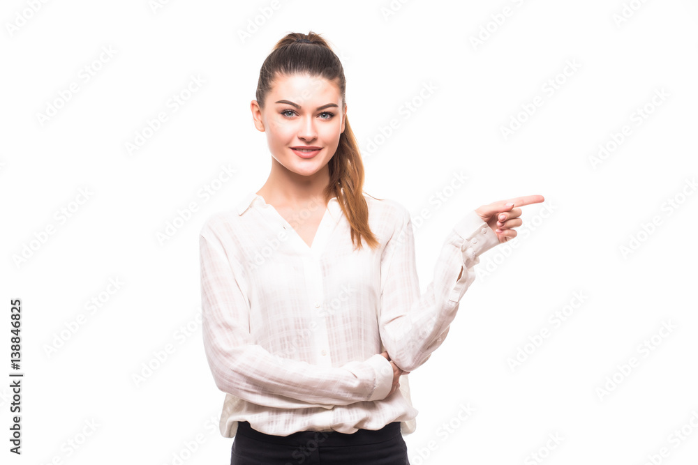 Smiling businesswoman pointing to the right Smiling businesswoman pointing to the right