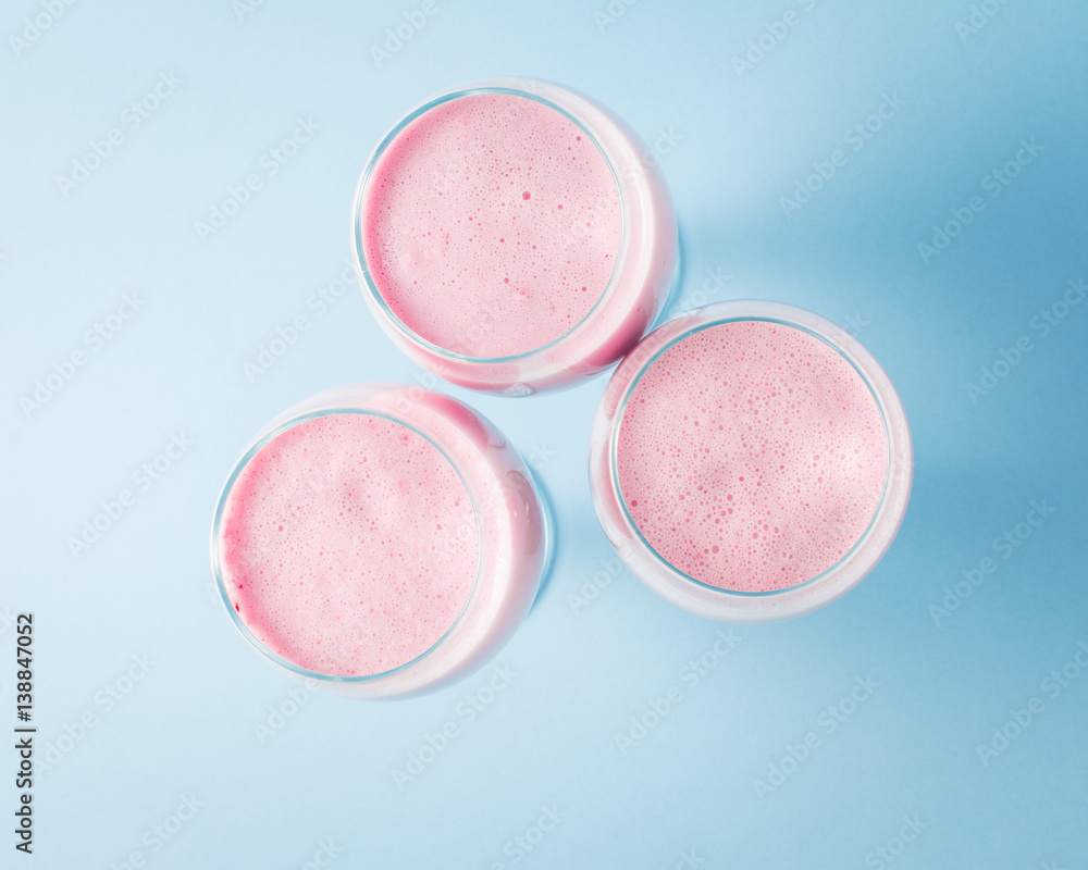 Glasses of milk shake with fresh strawberries Glasses of milk shake with fresh strawberries