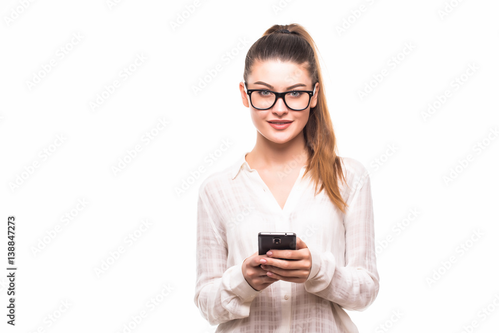 Business woman texting on her mobile phone Business woman texting on her mobile phone