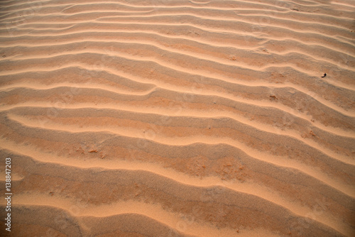 Sand wave at "Red sand dune" at Mui Ne city, Vietnam. © mnonchan