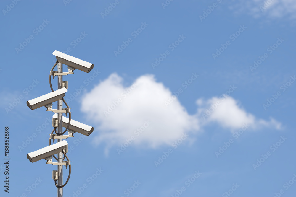 Group of traffic security CCTV with the sky. Group of traffic security CCTV with the sky.