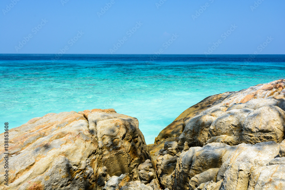 Sea and sky with rocks on beach at Tachai island, Southern Thailand