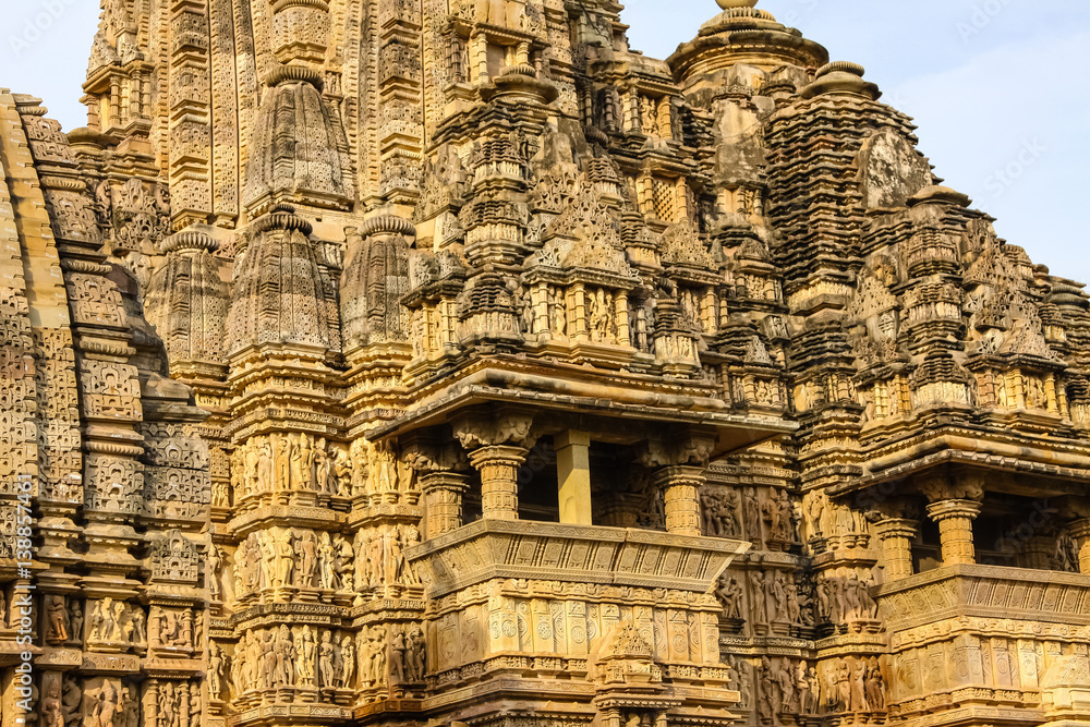 Close up of artful carved walls of Kandariya Mahadeva Temple, Khajuraho, India
