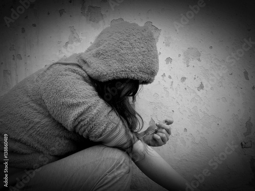 Young women use drugs in injection, young girl junkie with drug injection in palm, drugs addiction