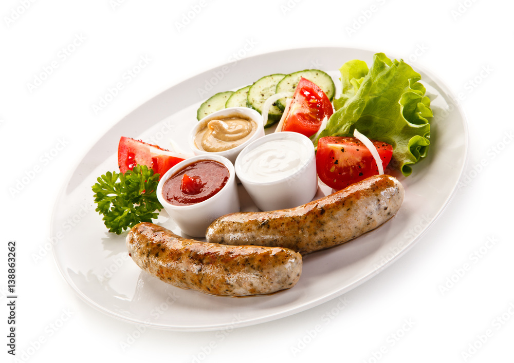 Breakfast - fried white sausages and vegetables 