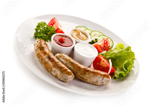 Breakfast - fried white sausages and vegetables 