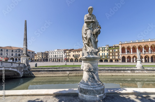 Ancient statues in the beautiful square called Prato della Valle, historic center of Padua, Veneto, Italy