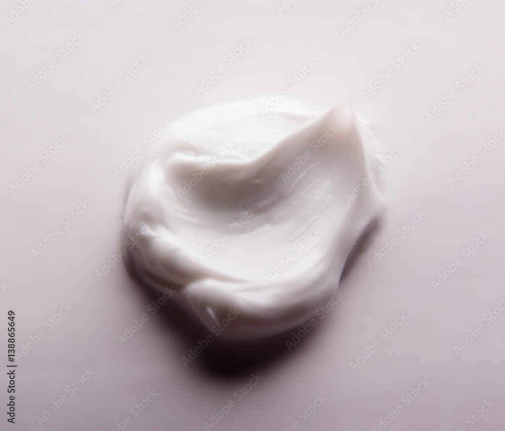 Smear cream isolated on white background. Cream texture. Smear cream isolated on white background. Cream texture.