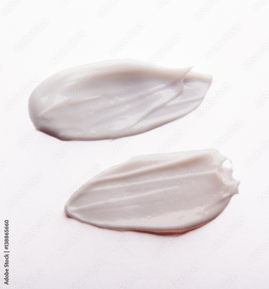 Smear cream isolated on white background. Cream texture. Smear cream isolated on white background. Cream texture.