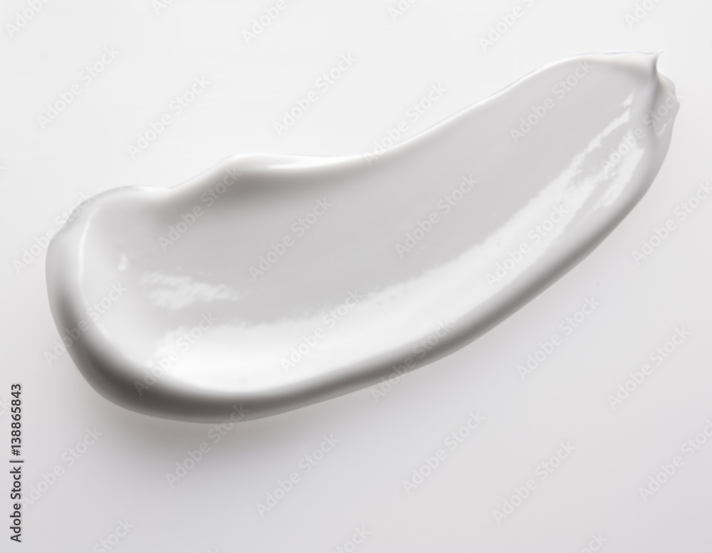Smear cream isolated on white background. Cream texture. Smear cream isolated on white background. Cream texture.