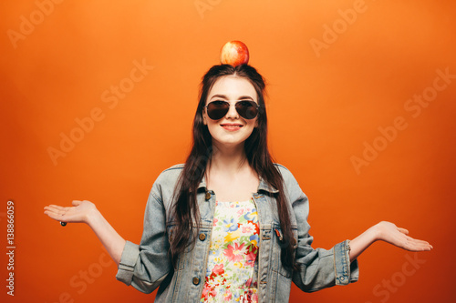 Beautiful teen girl. Hippy. orange background
