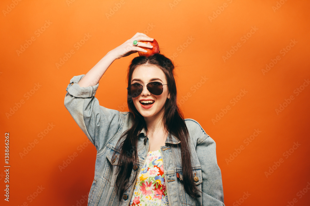 Beautiful teen girl. Hippy. orange background