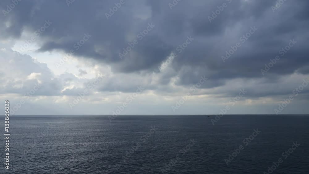 Stormy clouds over dark ocean ready for raining
Stormy clouds over dark ocean ready for raining