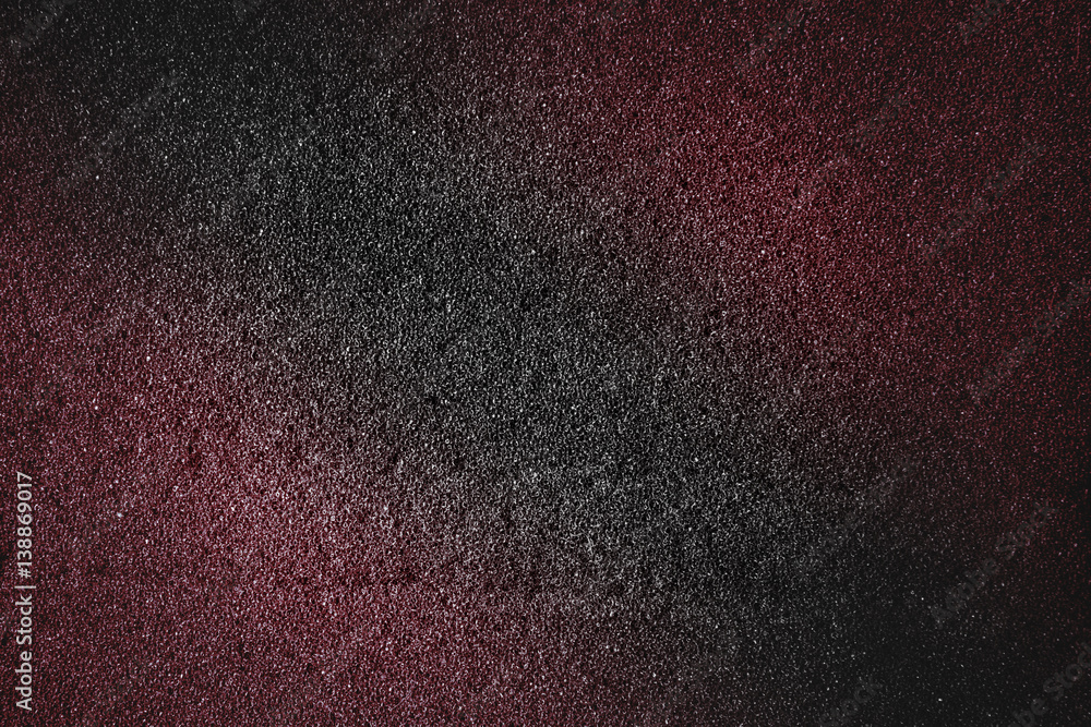 Colorful red pink abstract texture with black tone glitter background Colorful red pink abstract texture with black tone glitter background