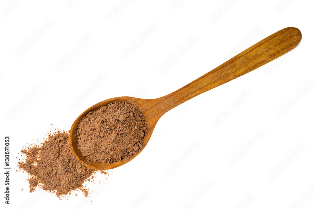 cinnamon powder in wooden spoon isolated on white background,top view cinnamon powder in wooden spoon isolated on white background,top view