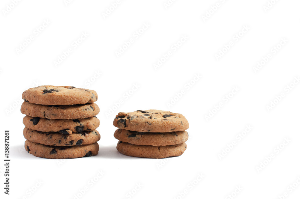 cookies with chocolate piled into two stacks of five and three on a white background cookies with chocolate piled into two stacks of five and three on a white background