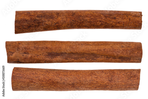 Cinnamon sticks isolated on white background macro shot