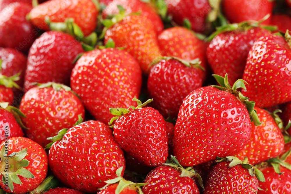 Fresh and tasty strawberries background, close up Fresh and tasty strawberries background, close up