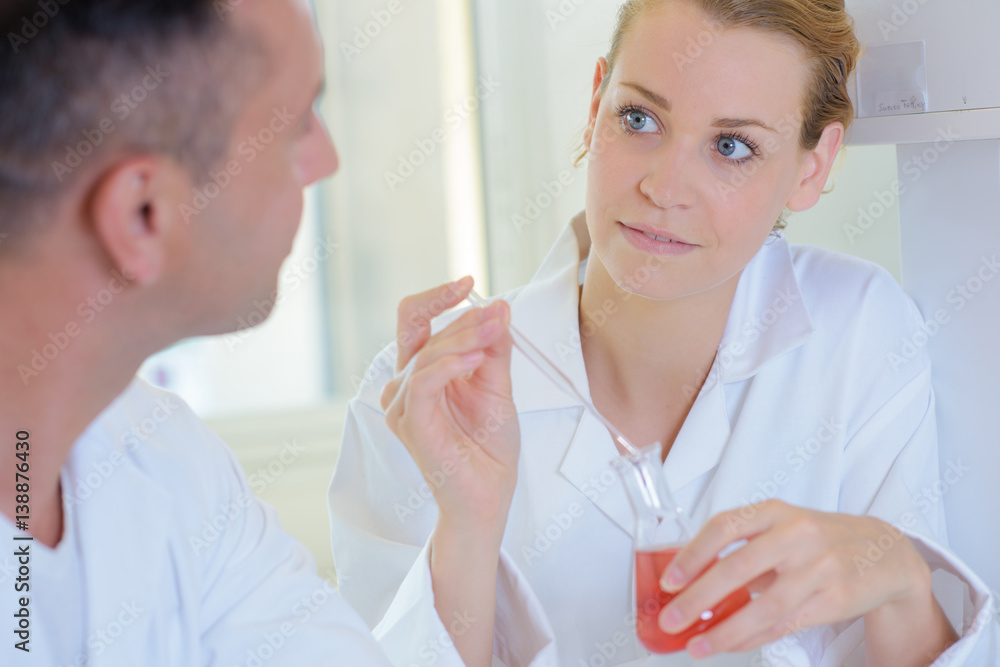Two lab technicians in discussion Two lab technicians in discussion